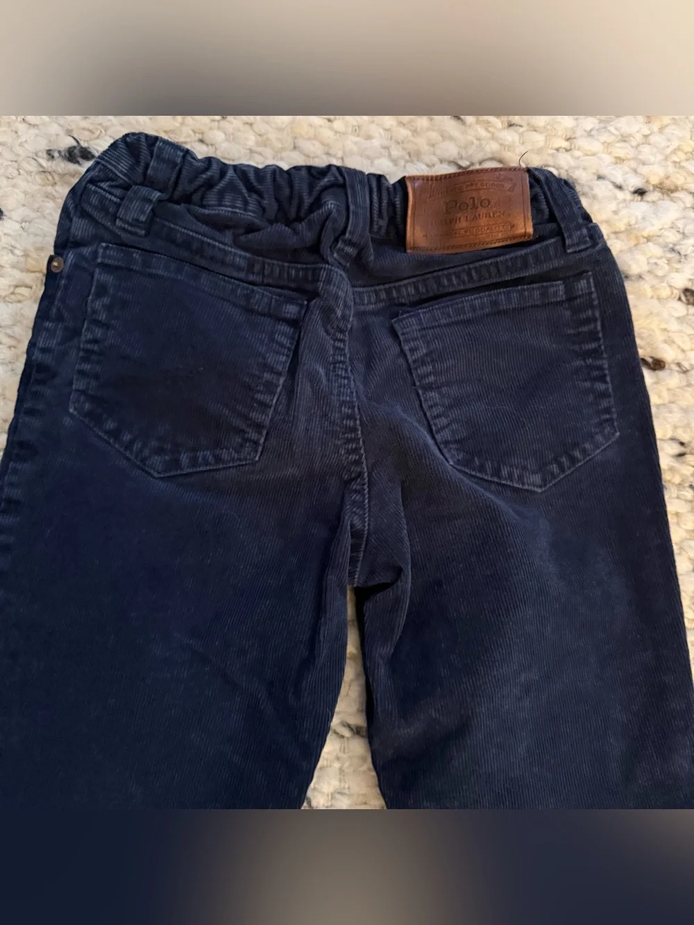 Ralph Lauren questions leave